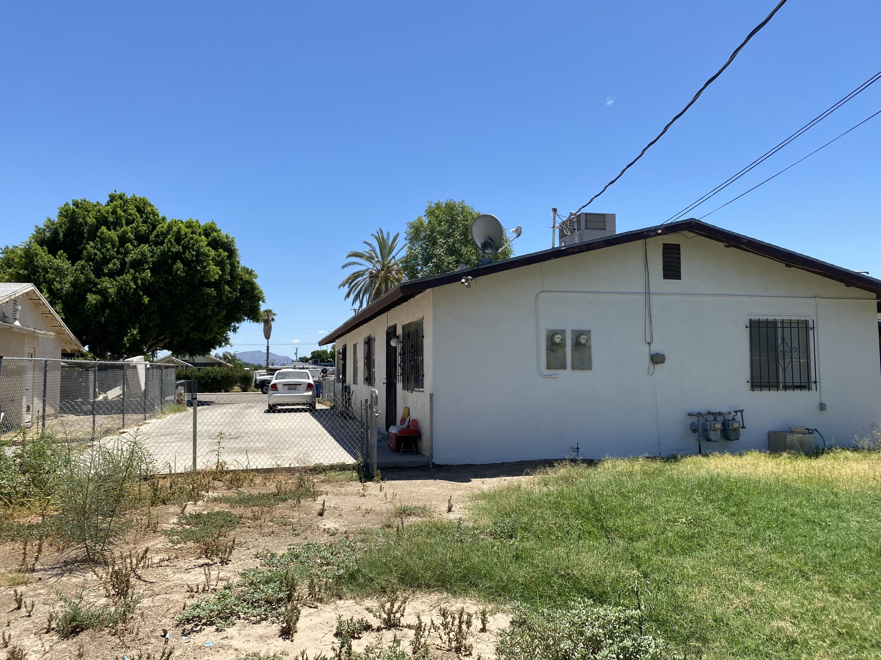 325 South Spring Street Blythe, CA 92225 - Photo 4 of 10 a house view with a backyard space