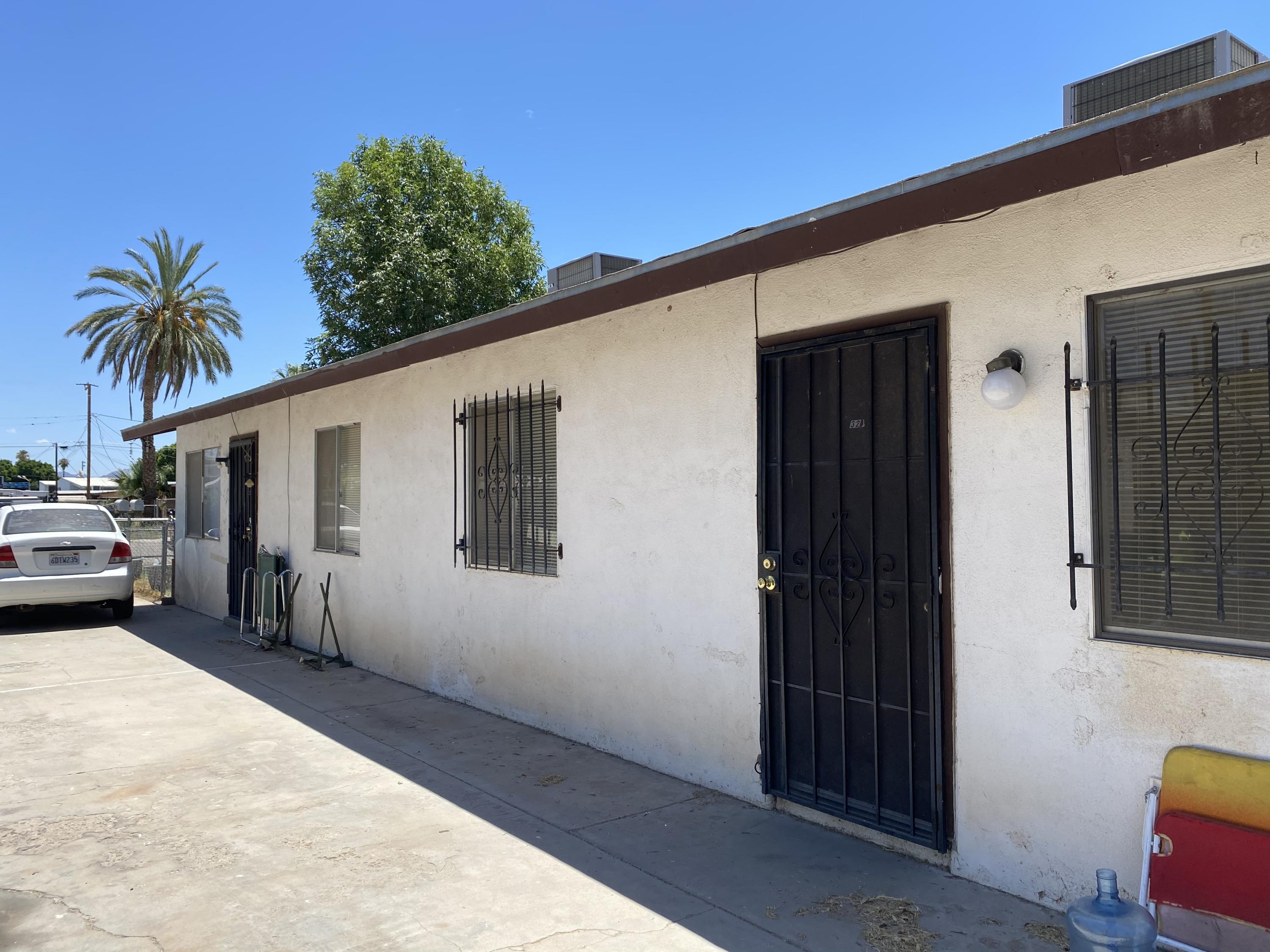 325 South Spring Street Blythe, CA 92225 - Photo 8 of 10 a view of a house with a patio
