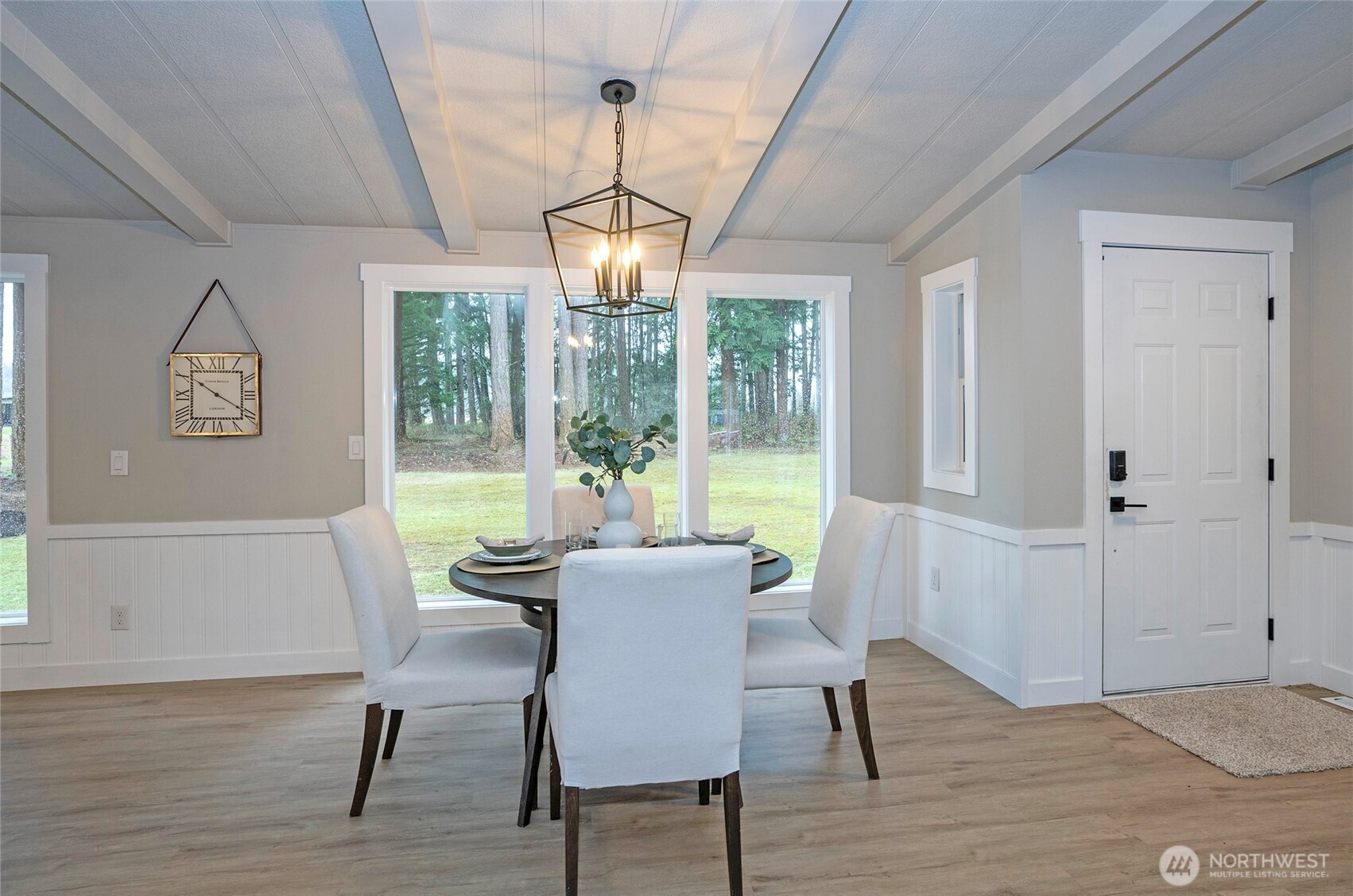 11810 Driver Street Southwest Olympia, WA 98512 - Photo 12 of 40 a view of a dining room with furniture window and wooden floor