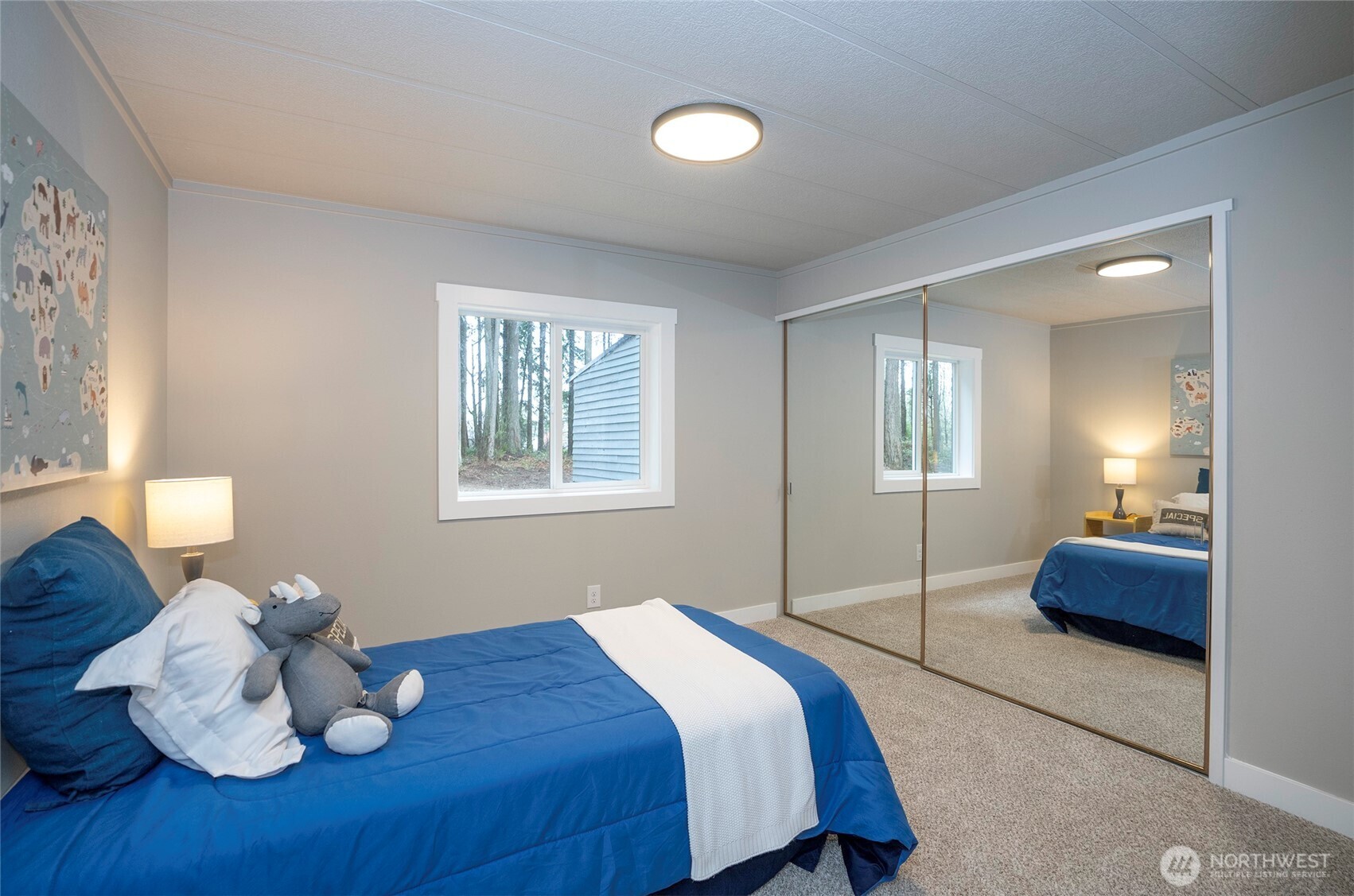 11810 Driver Street Southwest Olympia, WA 98512 - Photo 27 of 40 a bedroom with a bed and a window