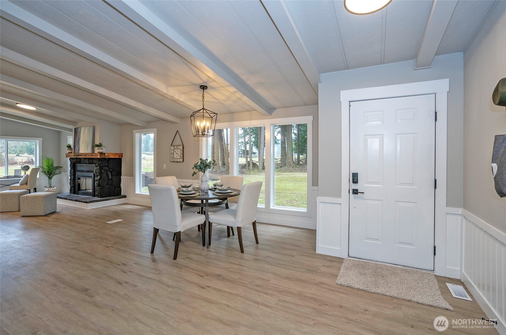 11810 Driver Street Southwest Olympia, WA 98512 - Photo 4 of 40 a view of a dining room with furniture window and wooden floor
