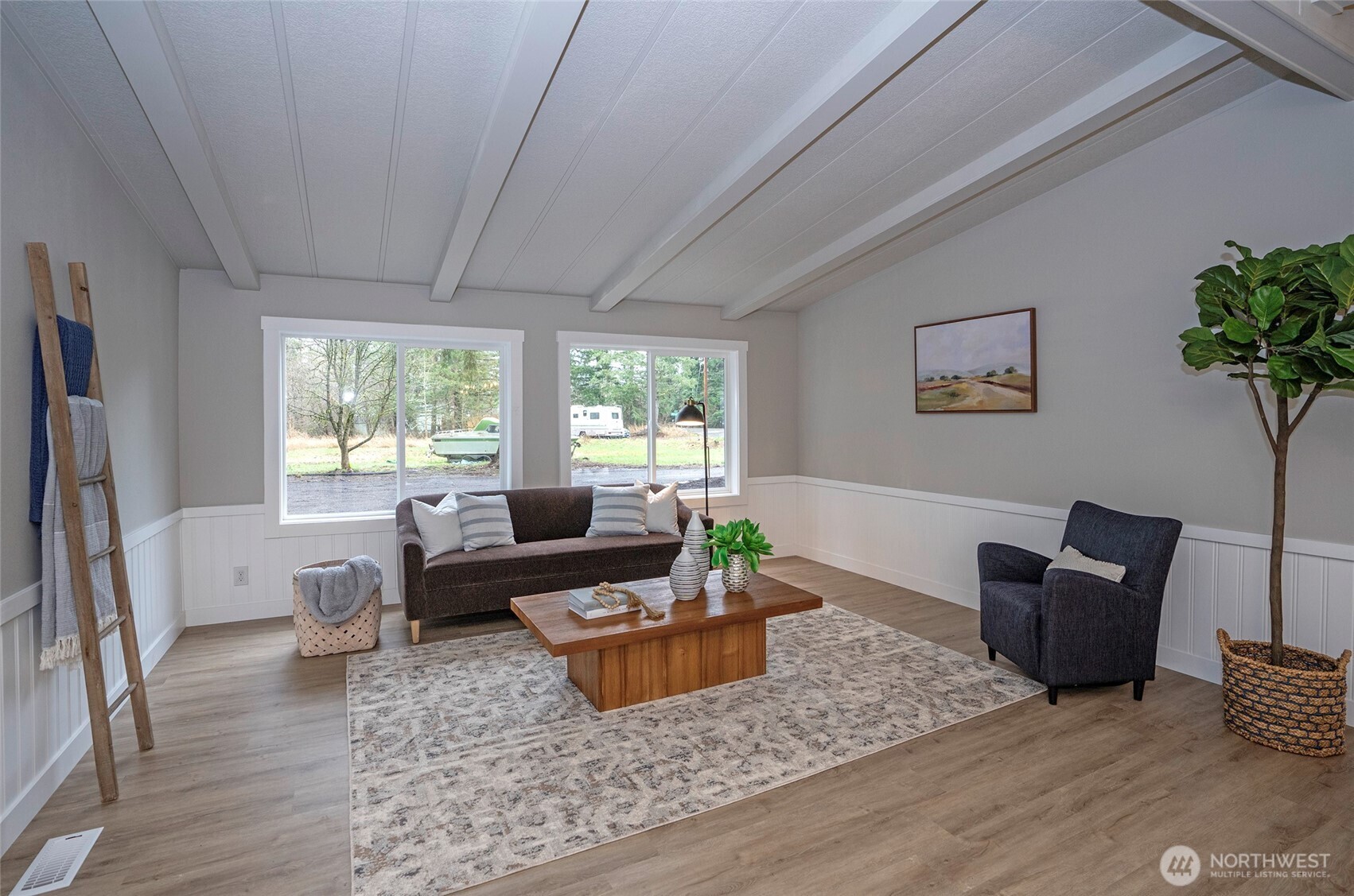 11810 Driver Street Southwest Olympia, WA 98512 - Photo 5 of 40 a living room with furniture and a potted plant
