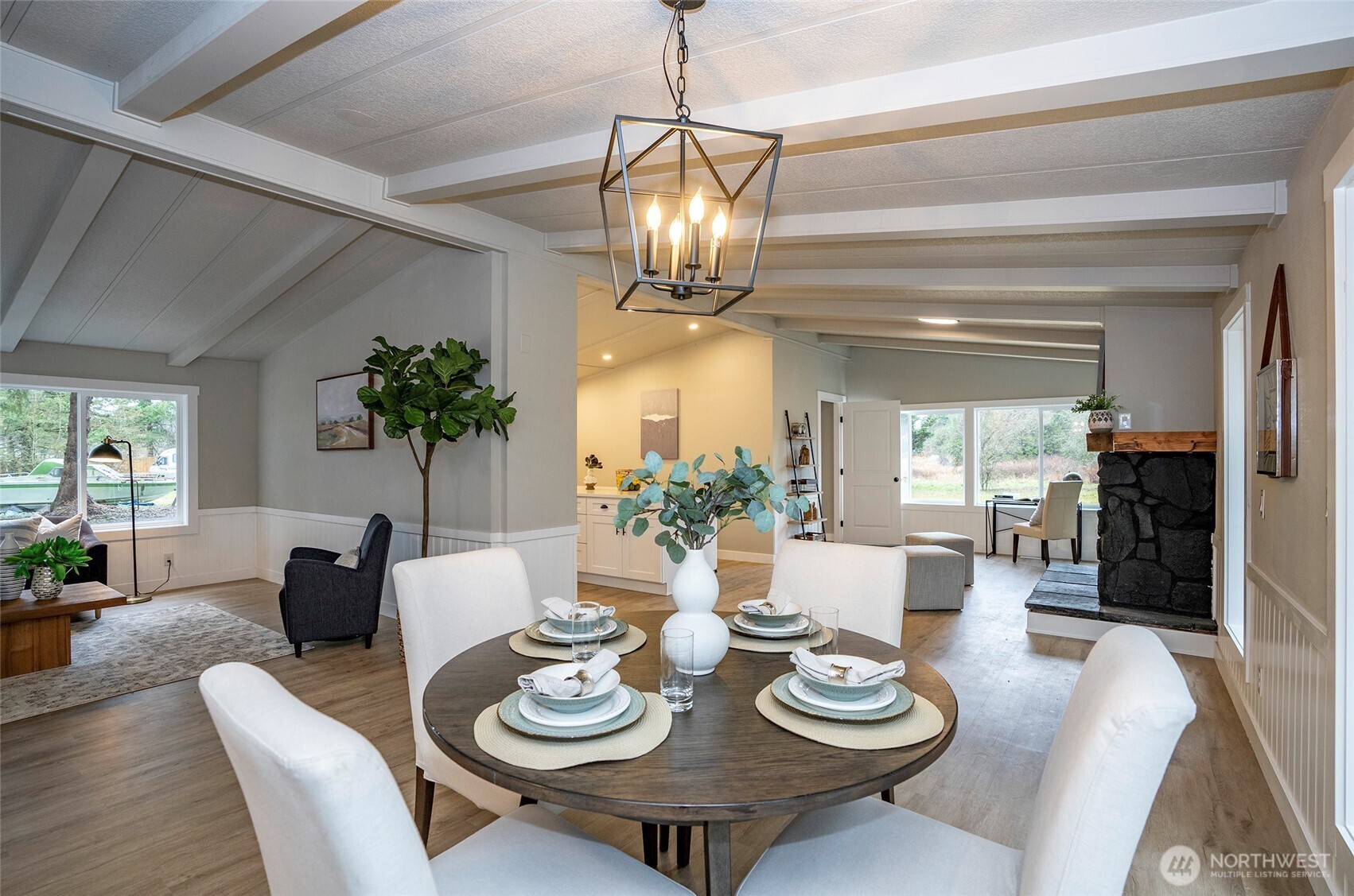 11810 Driver Street Southwest Olympia, WA 98512 - Photo 10 of 40 a dining room with furniture a chandelier and wooden floor