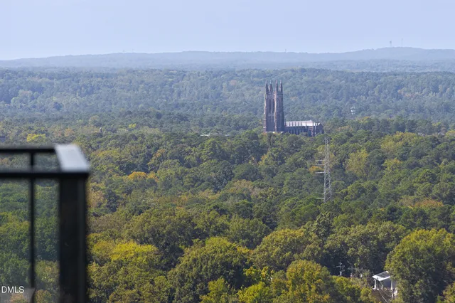 a view of a city with tall buildings