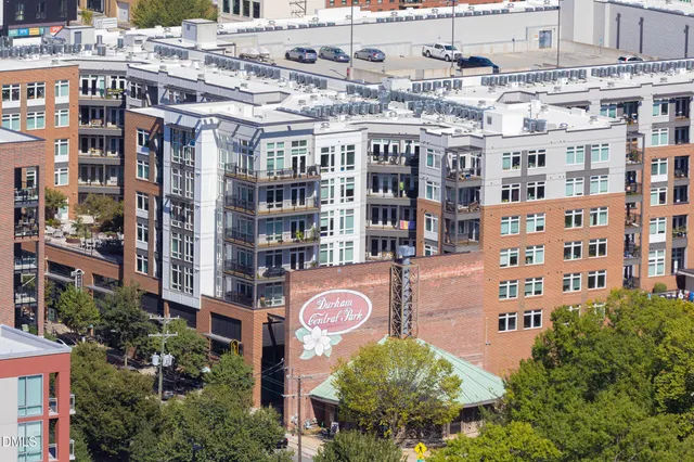 a view of swimming pool with outdoor seating