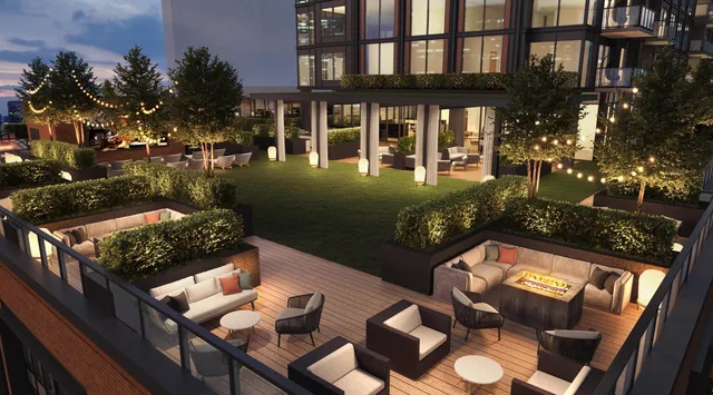 a porch with a table and chairs