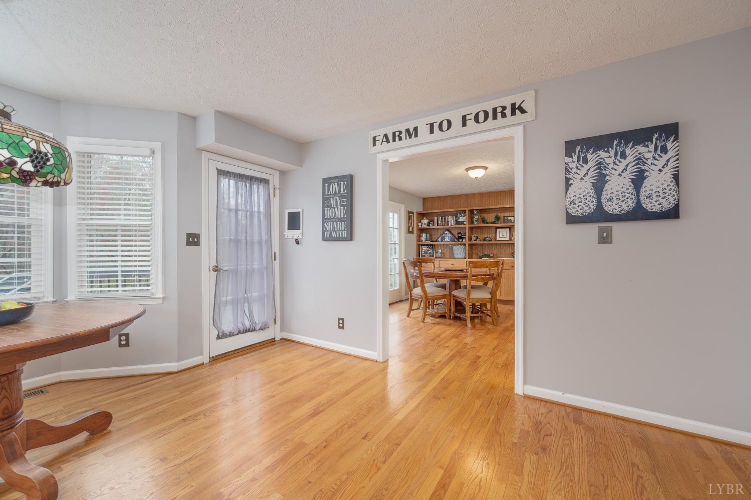 1498 Hooper Road Forest, VA 24551 - Photo 16 of 48 a view of livingroom with furniture and wooden floor