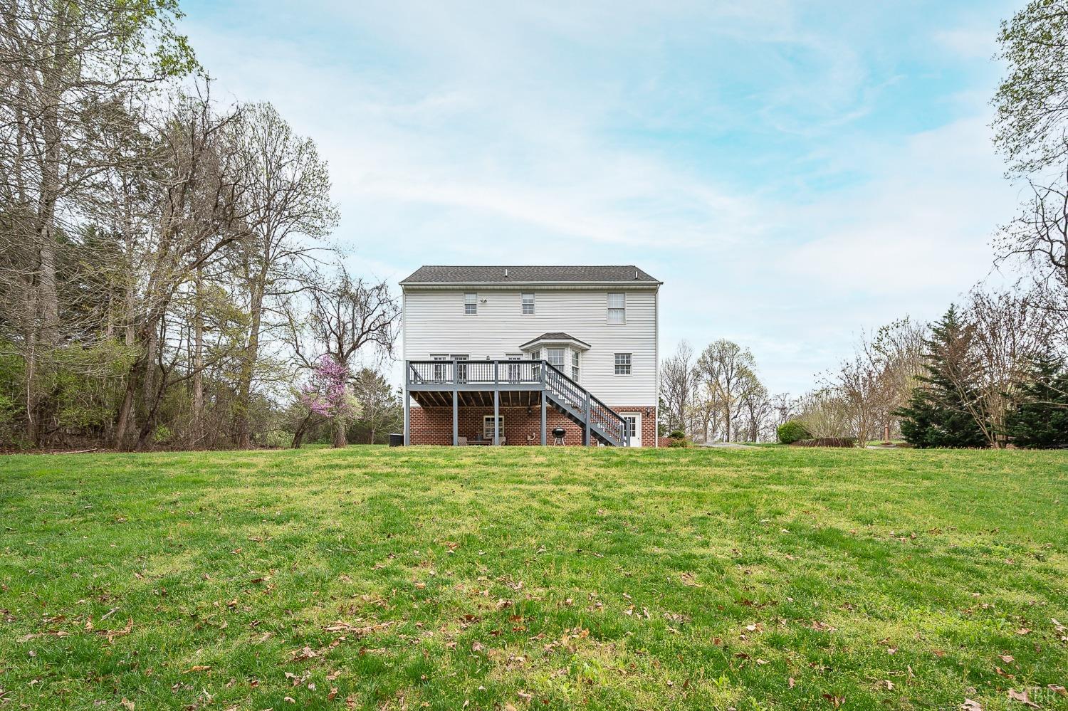 1498 Hooper Road Forest, VA 24551 - Photo 46 of 48 a view of a house with a yard and garage