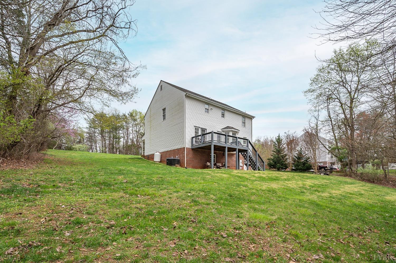 1498 Hooper Road Forest, VA 24551 - Photo 47 of 48 a view of a backyard with large trees