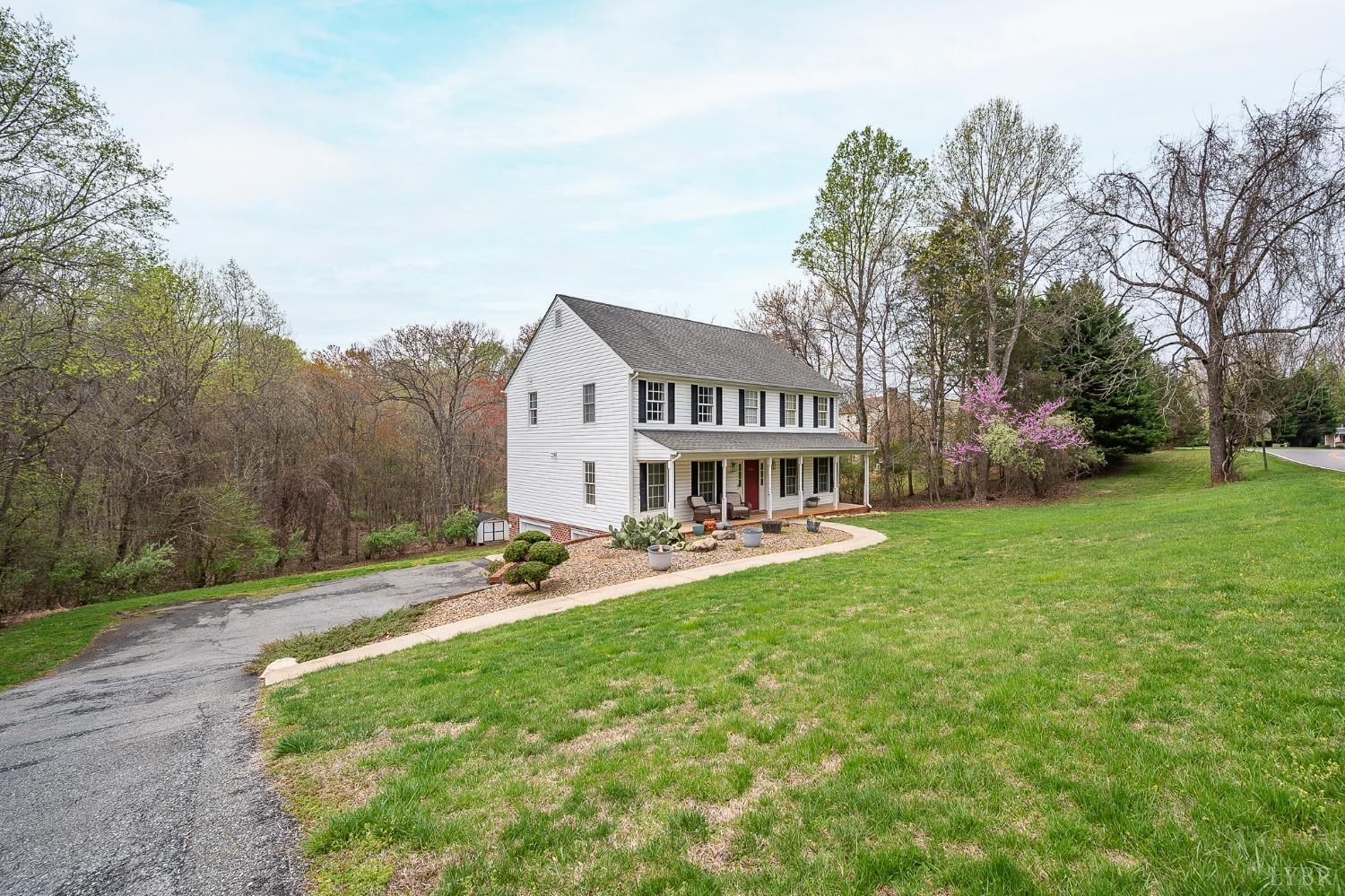 1498 Hooper Road Forest, VA 24551 - Photo 5 of 48 a view of a house with backyard and sitting area