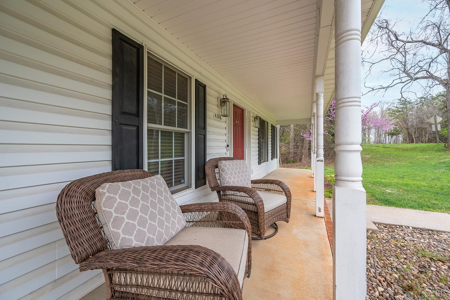 1498 Hooper Road Forest, VA 24551 - Photo 6 of 48 a balcony with furniture and a garden