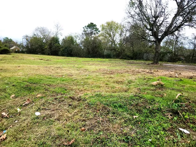 a view of a outdoor space with swimming pool