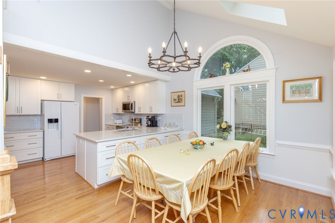 5724 Grove Forest Road Midlothian, VA 23112 - Photo 14 of 47 Open-concept kitchen and dining area featuring vau