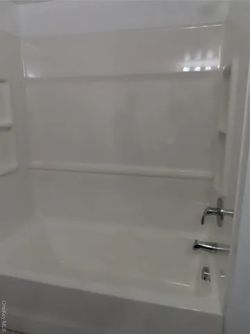 a close up of a bathtub