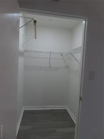 a view of a room with racks on the wall