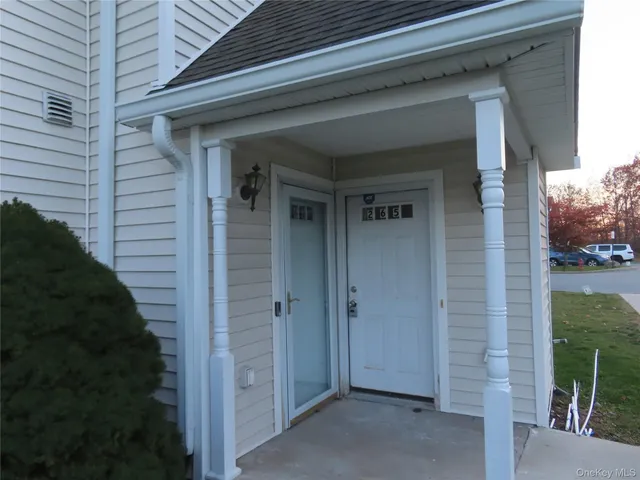 a view of front door and porch
