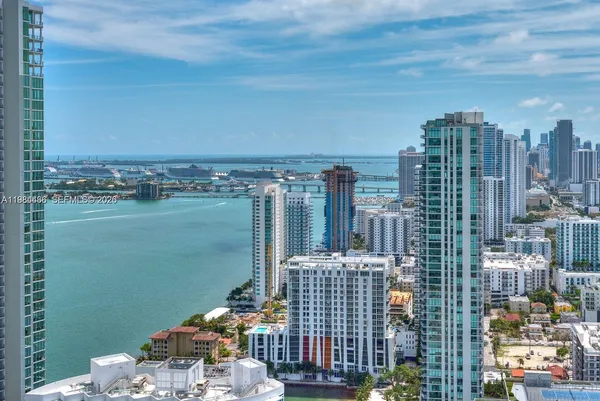 a view of a city with tall buildings