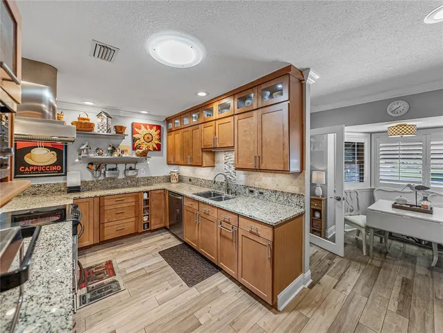 a spacious bathroom with a double vanity sink mirror and shower