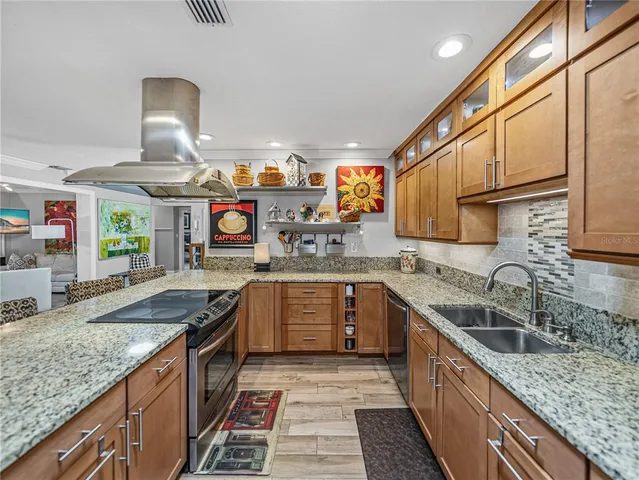 a bathroom with a sink a mirror and a toilet