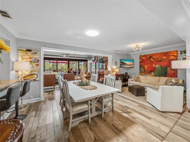 a bathroom with a refrigerator and a sink