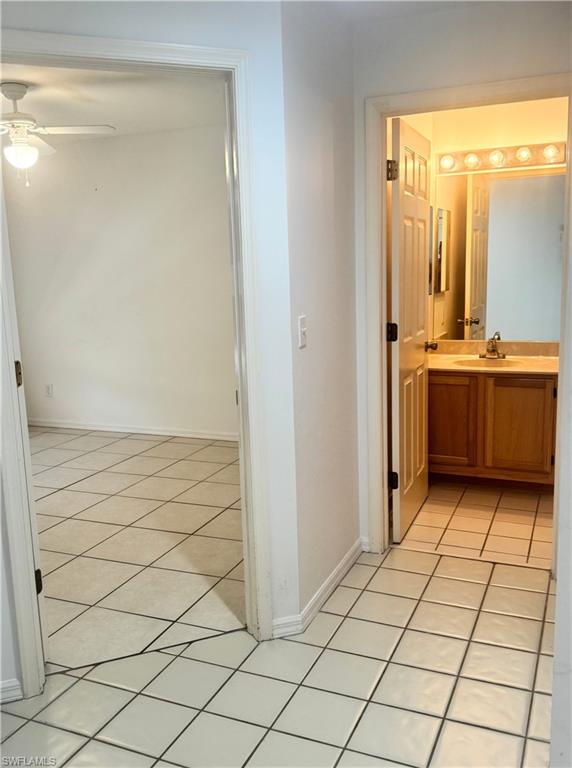 9852 Luna Circle, Unit B203 Naples, FL 34109 - Photo 13 of 16 a view of a kitchen