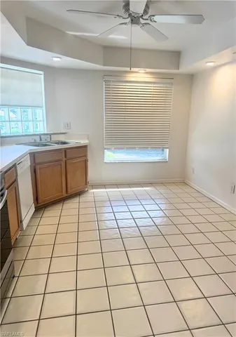 a view of a kitchen with a sink