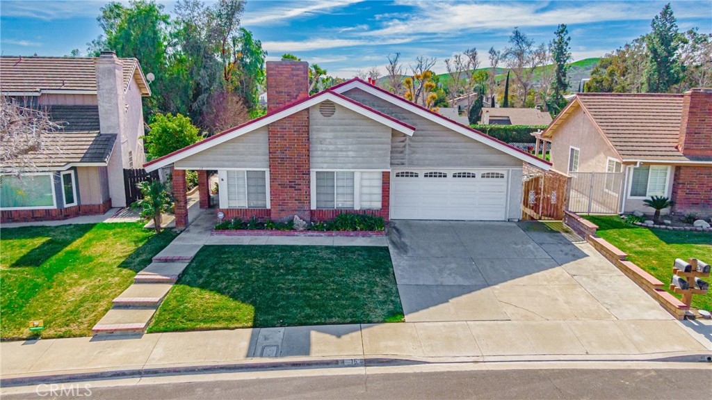 16 Stagecoach Drive Phillips Ranch, CA 91766 - Photo 1 of 1 a view of a yard in front view of a house
