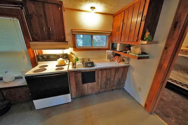 $109,500 | 461 Sandy Beach Road, Danforth, ME 04424