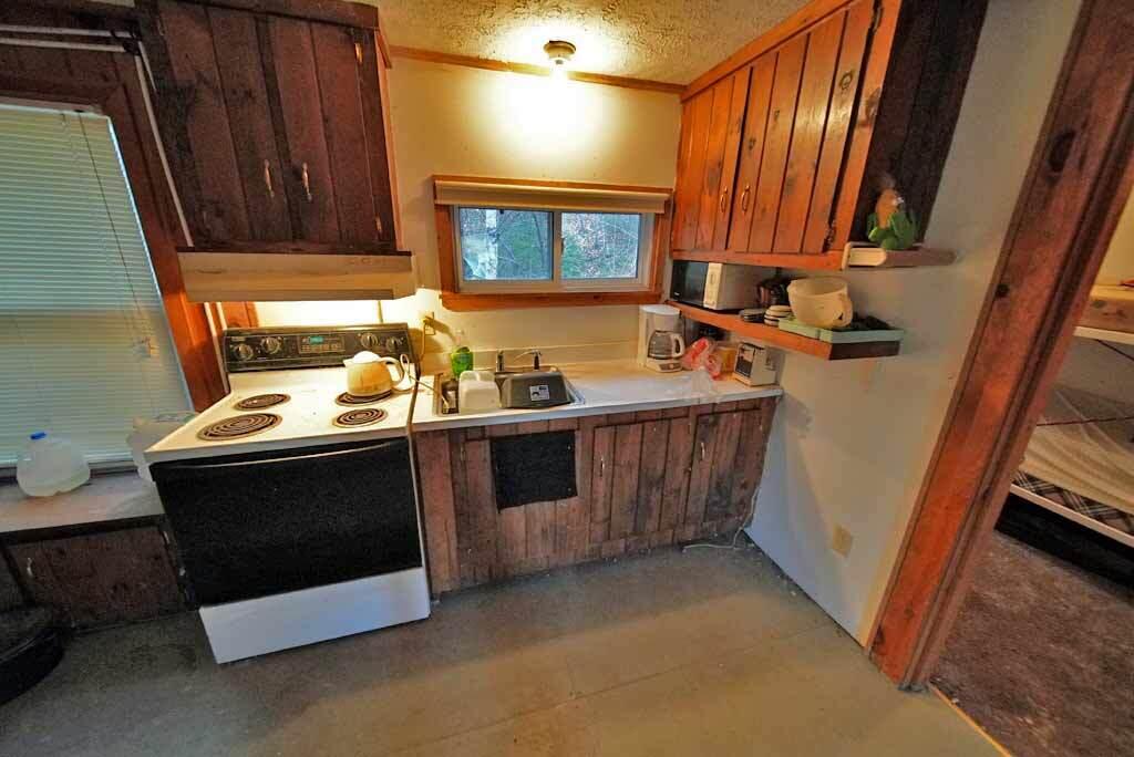 461 Sandy Beach Road Danforth, ME 04424 - Photo 23 of 39 lake-camp-kitchen