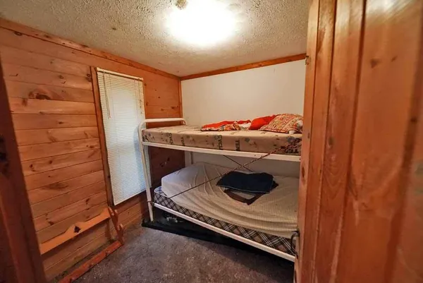 $109,500 | 461 Sandy Beach Road, Danforth, ME 04424