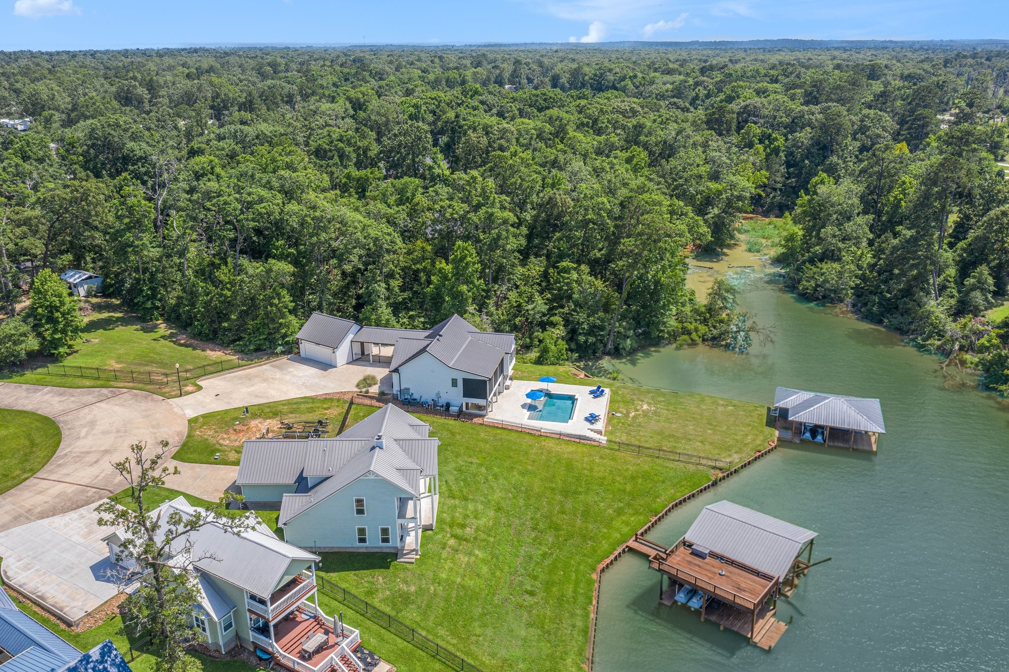 111 Seagull Path Point Blank, TX 77364 - Photo 49 of 49 Arial view of this large property and cove. Stunning!!!