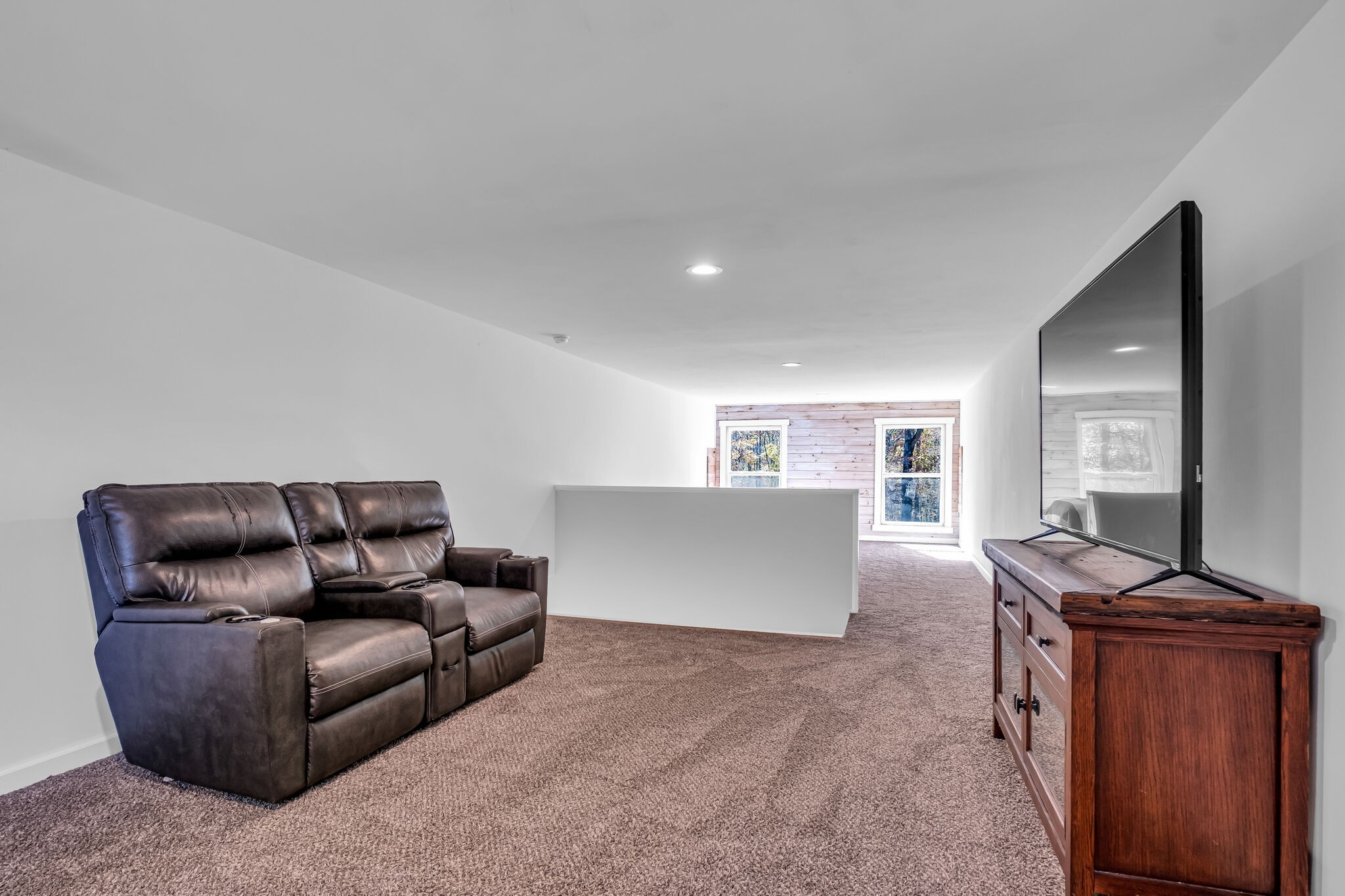 761 Metal Ford Road Hohenwald, TN 38462 - Photo 14 of 60 a living room with furniture and a flat screen tv