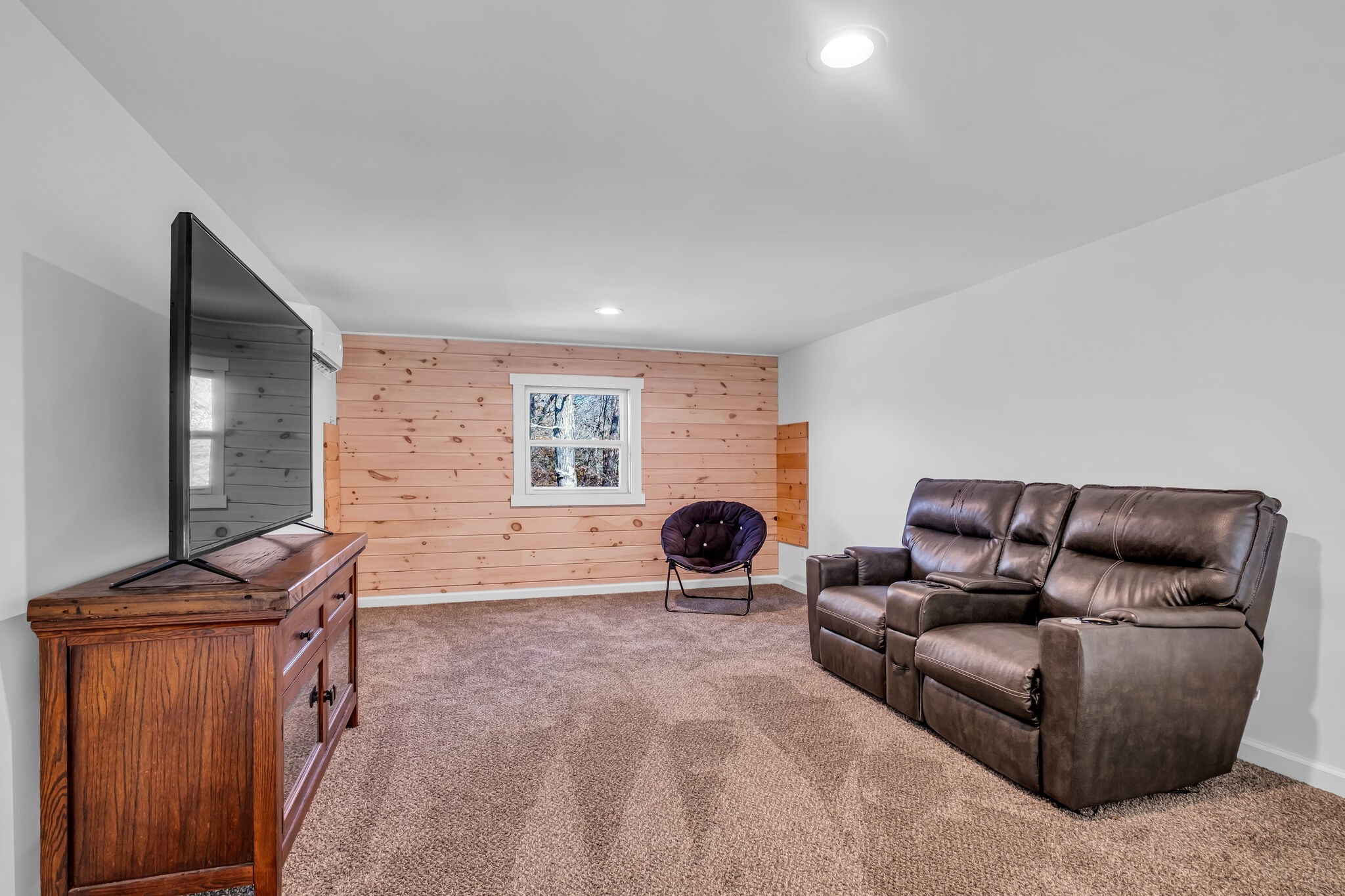 761 Metal Ford Road Hohenwald, TN 38462 - Photo 15 of 60 a living room with furniture and a window