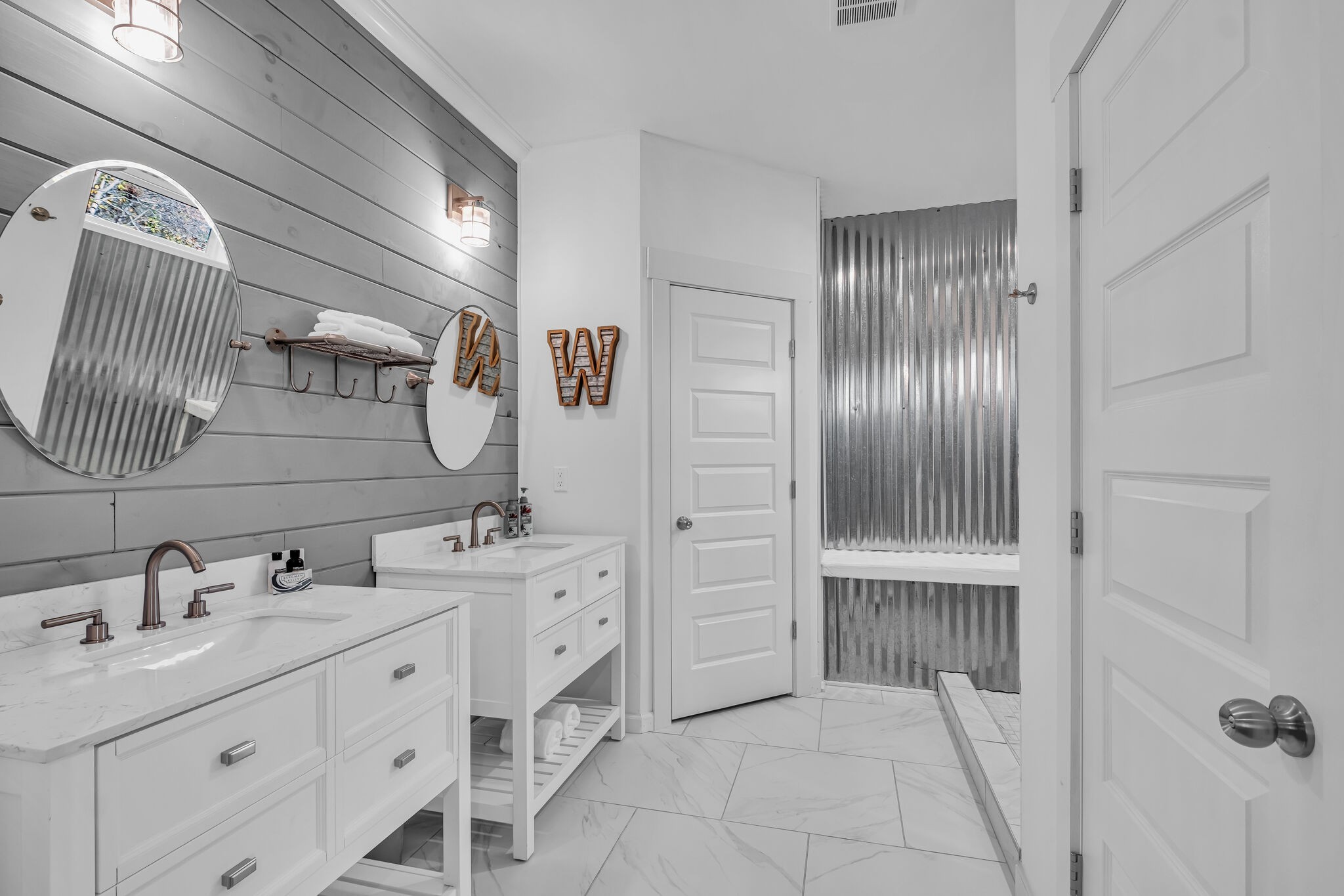 761 Metal Ford Road Hohenwald, TN 38462 - Photo 25 of 60 a bathroom with a sink and a mirror