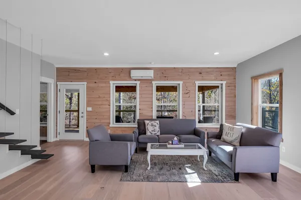 a living room with large windows
