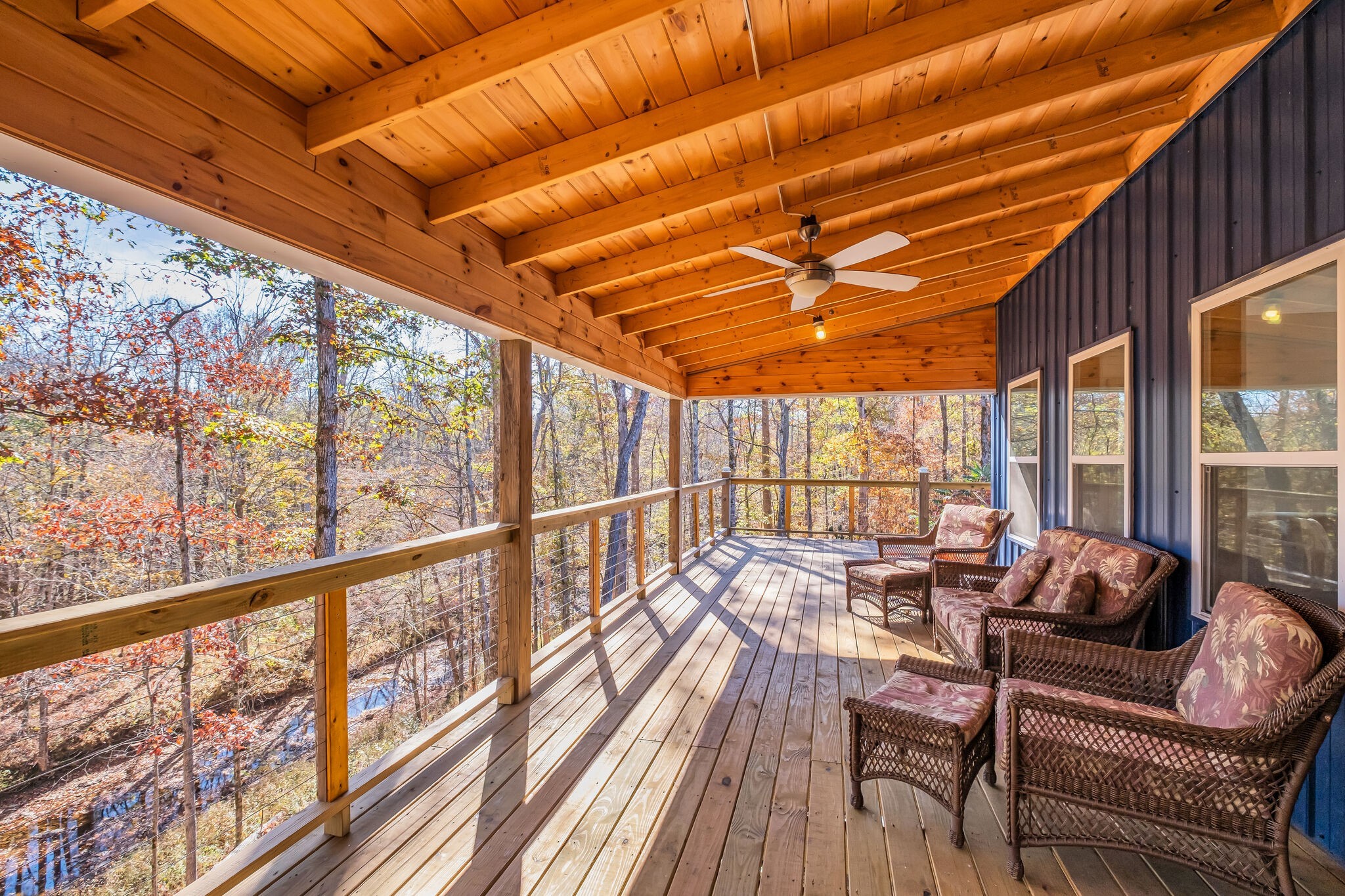 761 Metal Ford Road Hohenwald, TN 38462 - Photo 47 of 60 a living room with large windows