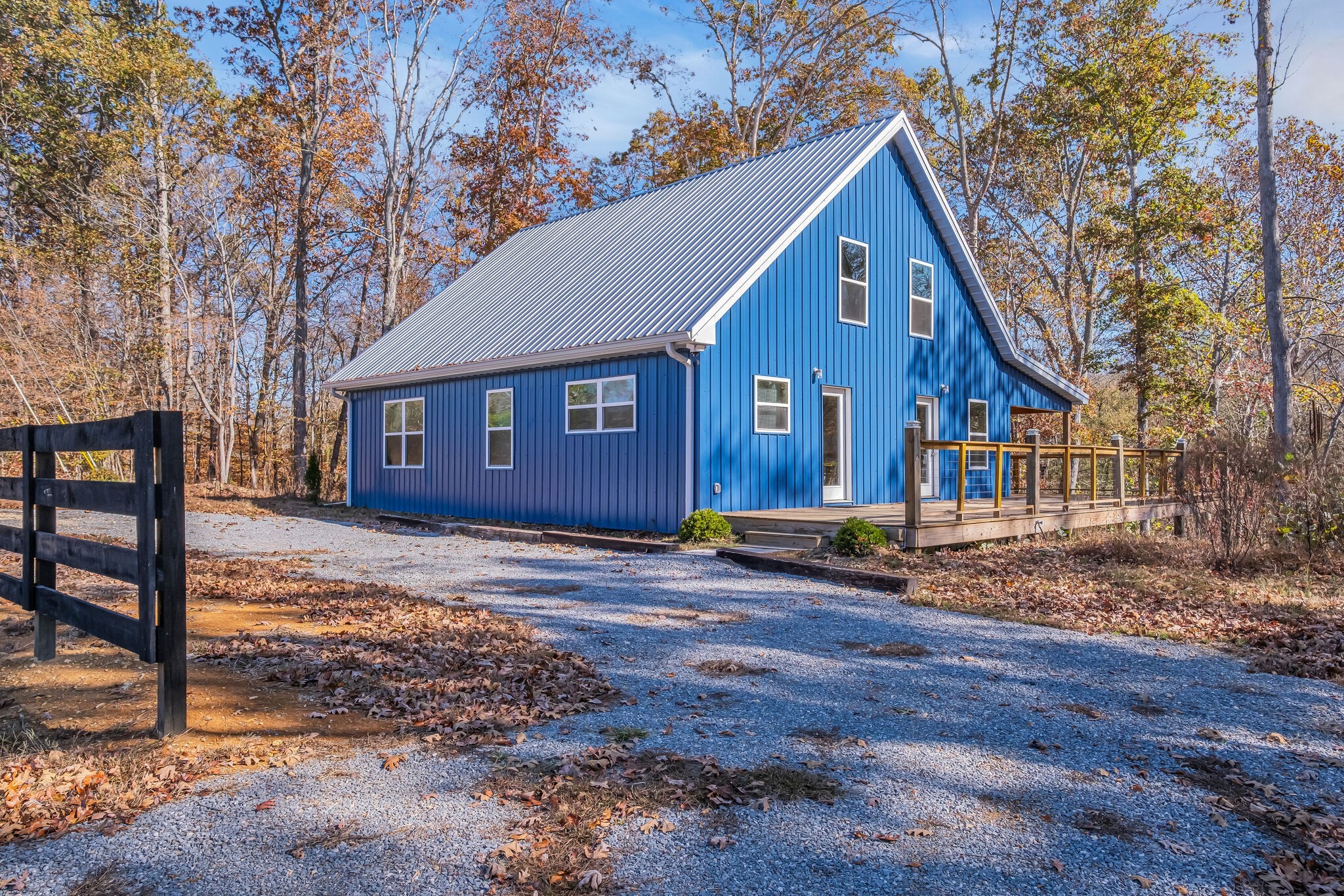 761 Metal Ford Road Hohenwald, TN 38462 - Photo 53 of 60 a front view of a house with a yard