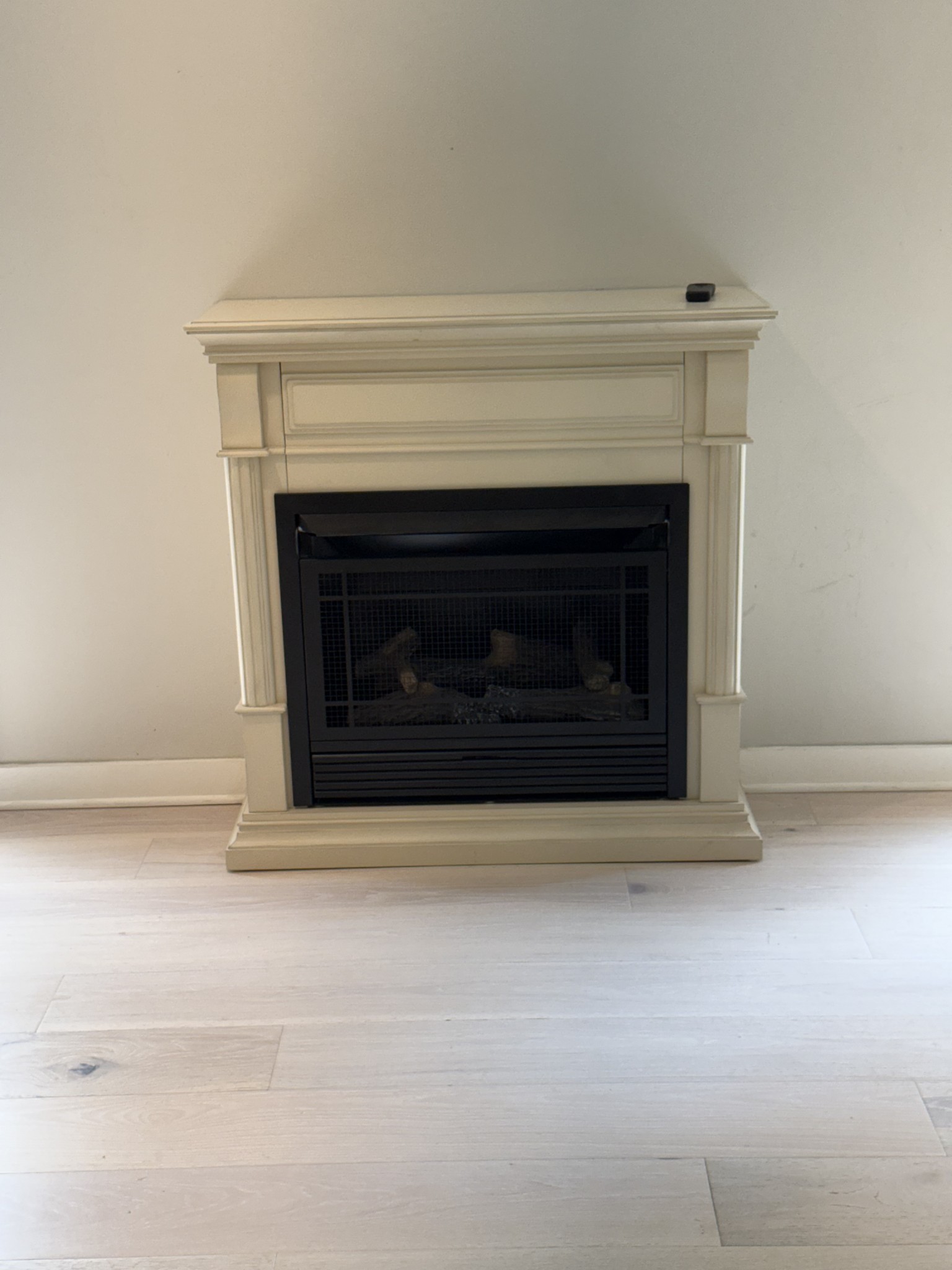 761 Metal Ford Road Hohenwald, TN 38462 - Photo 60 of 60 a fireplace with a fireplace