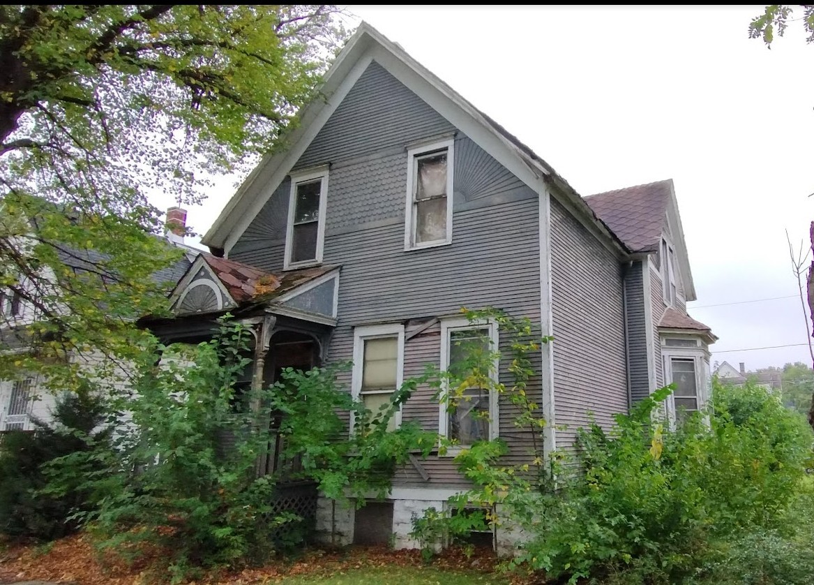 a house view with a garden space
