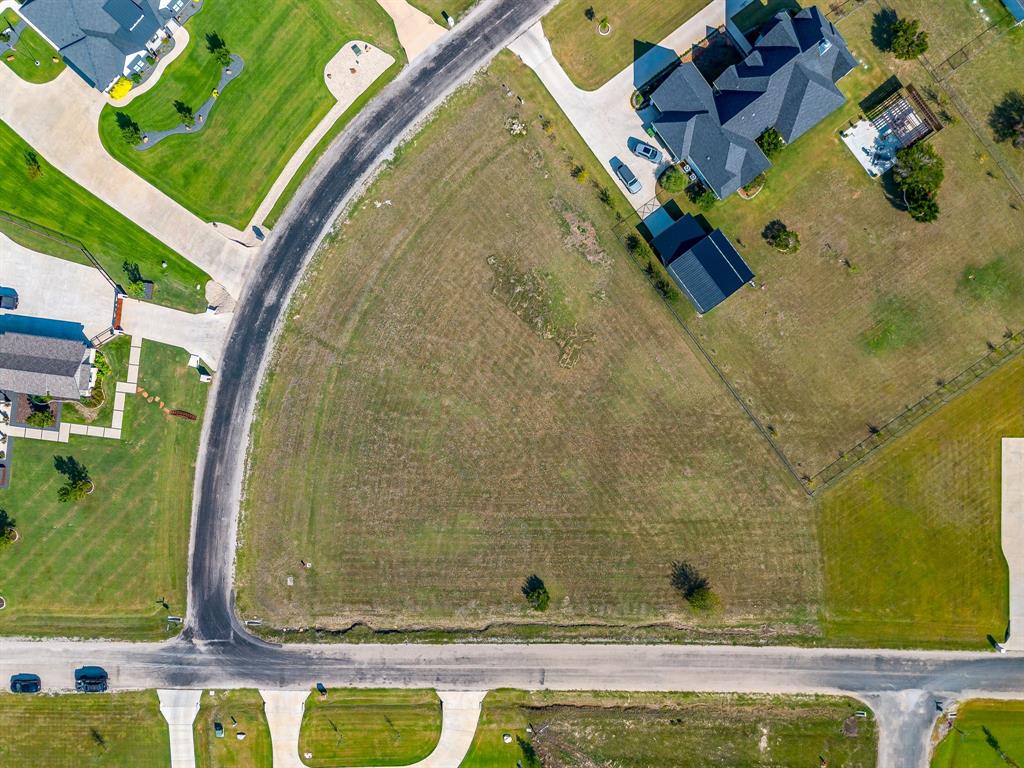 6425 Rigel Road Godley, TX 76044 - Photo 5 of 11 an aerial view of a residential houses with yard