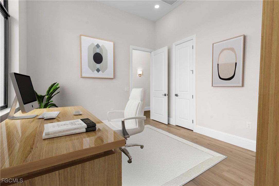 3383 Chestnut Grove Drive Alva, FL 33920 - Photo 22 of 33 a view of workspace with mirror on the wall