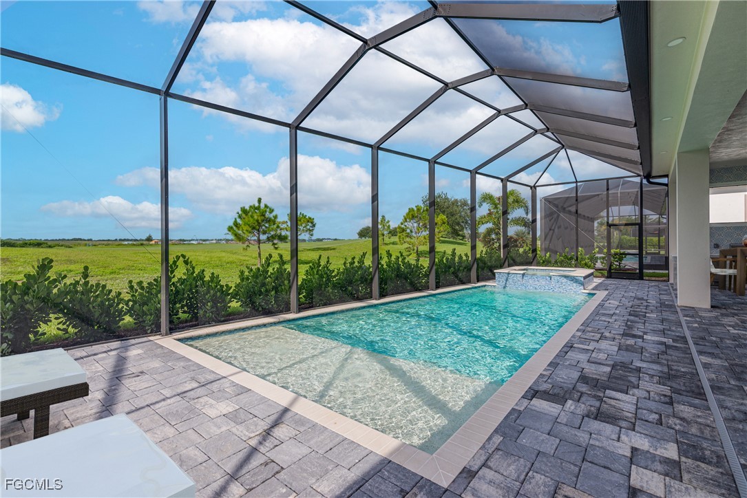 3383 Chestnut Grove Drive Alva, FL 33920 - Photo 24 of 33 a view of a backyard with plants and garden