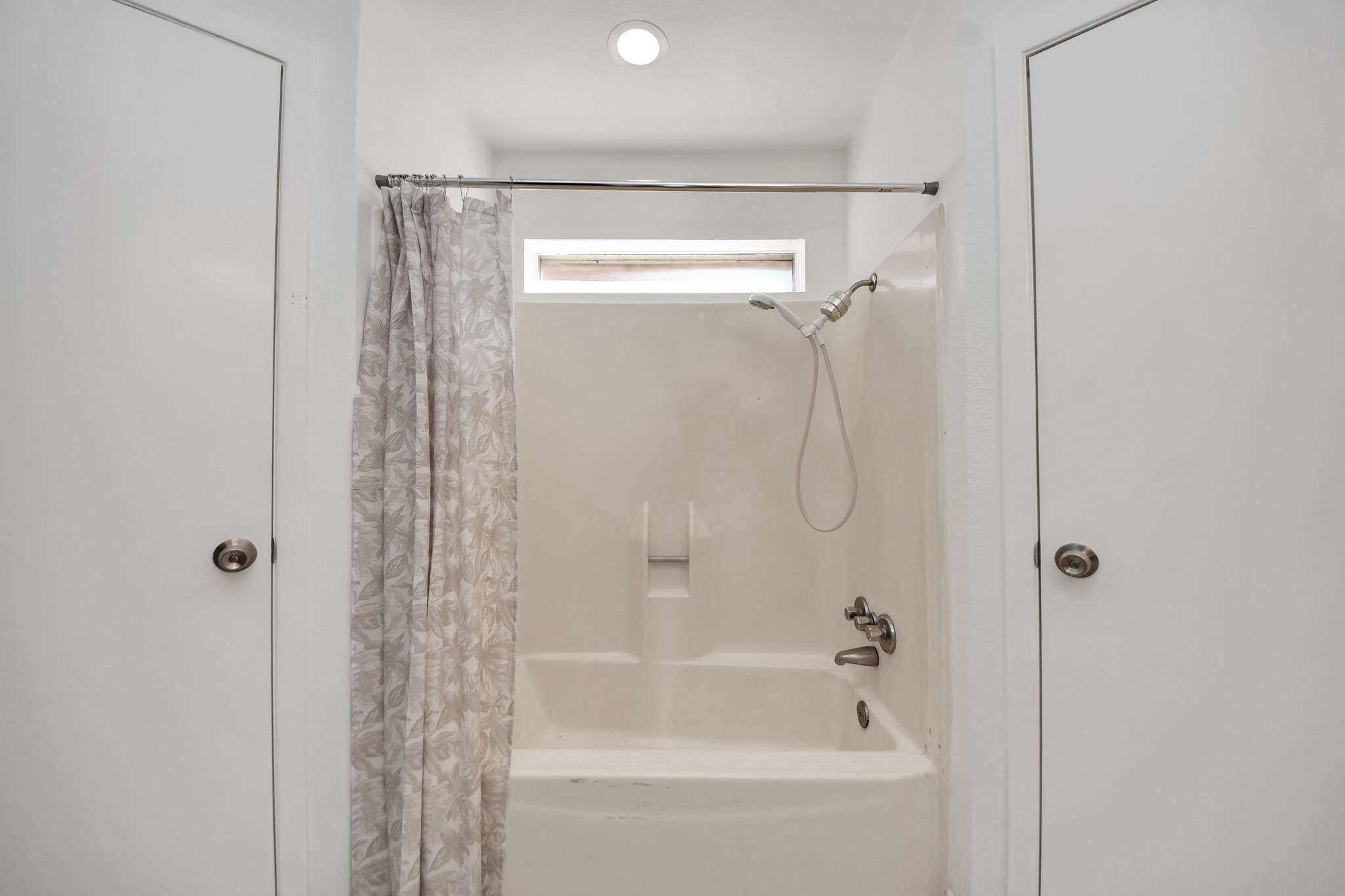 5306 Mossgrey Lane Spring, TX 77373 - Photo 11 of 19 a bathroom with a shower and a bath tub