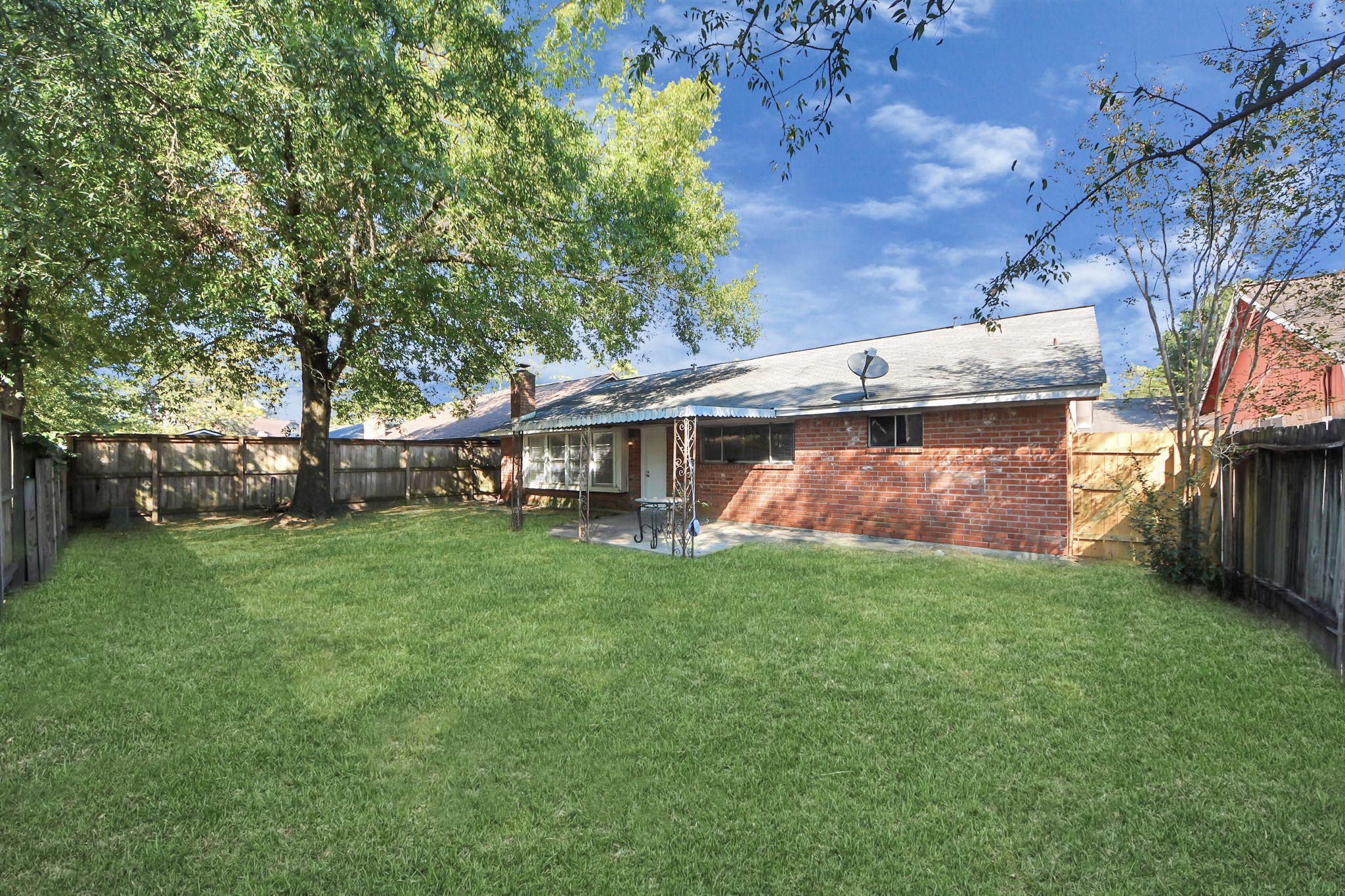 5306 Mossgrey Lane Spring, TX 77373 - Photo 15 of 19 front view of a house with a yard