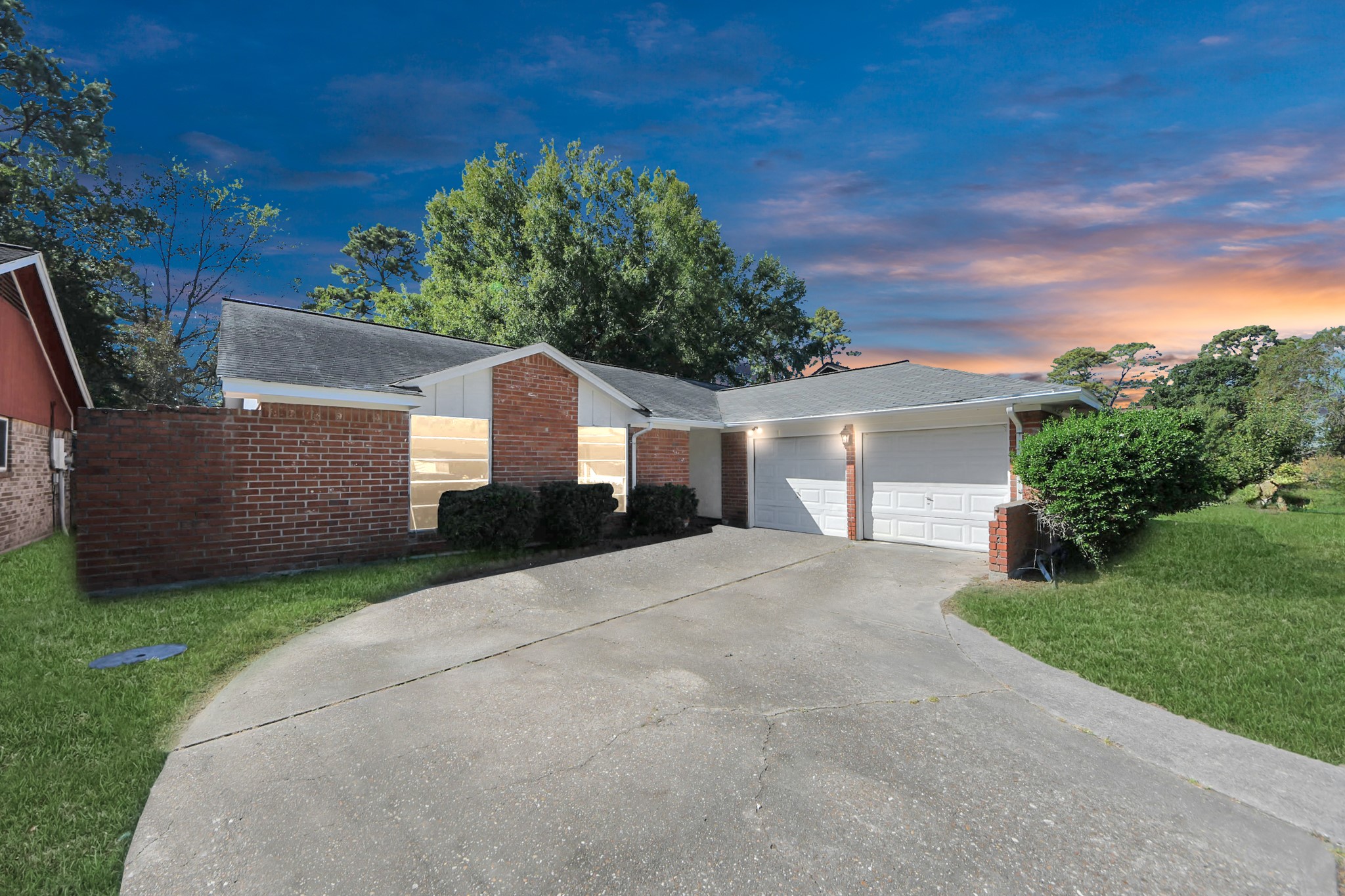 5306 Mossgrey Lane Spring, TX 77373 - Photo 19 of 19 a front view of a house with a yard and garage