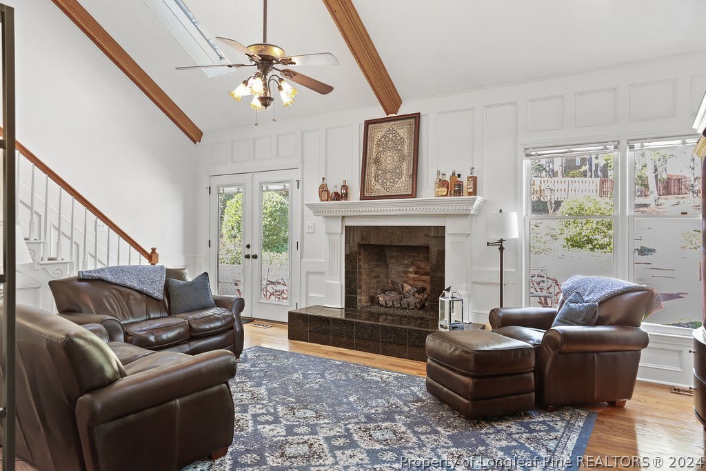 300 Shawcroft Road Fayetteville, NC 28311 - Photo 12 of 42 a living room with furniture and a fireplace