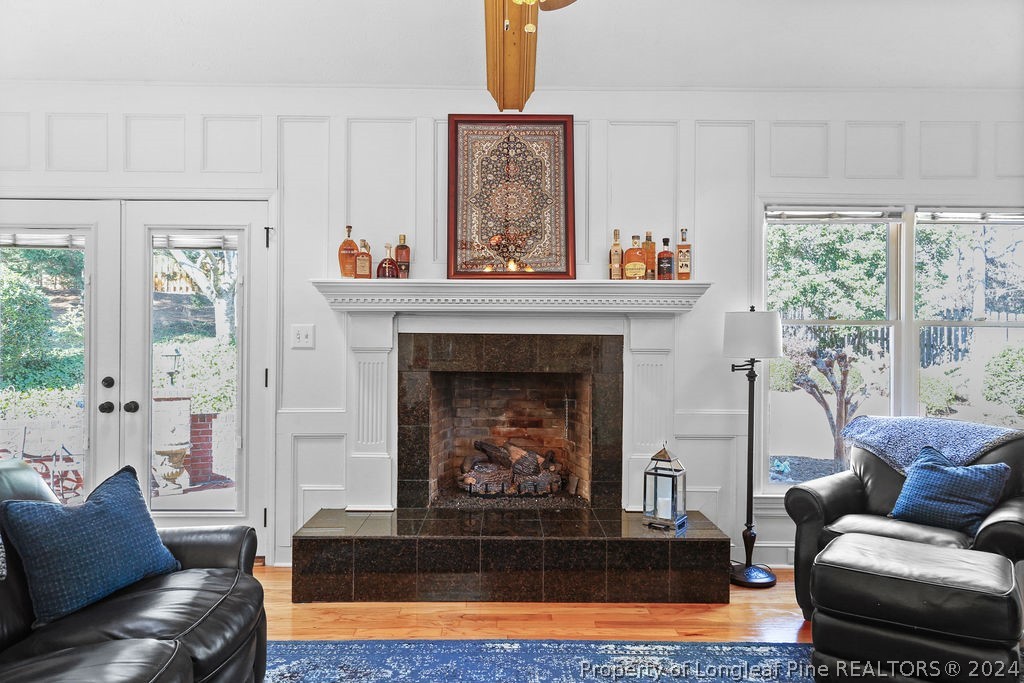 300 Shawcroft Road Fayetteville, NC 28311 - Photo 13 of 42 a living room with furniture and a fireplace