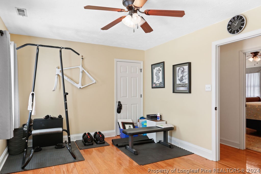 300 Shawcroft Road Fayetteville, NC 28311 - Photo 23 of 42 a view of a livingroom with workspace and a window