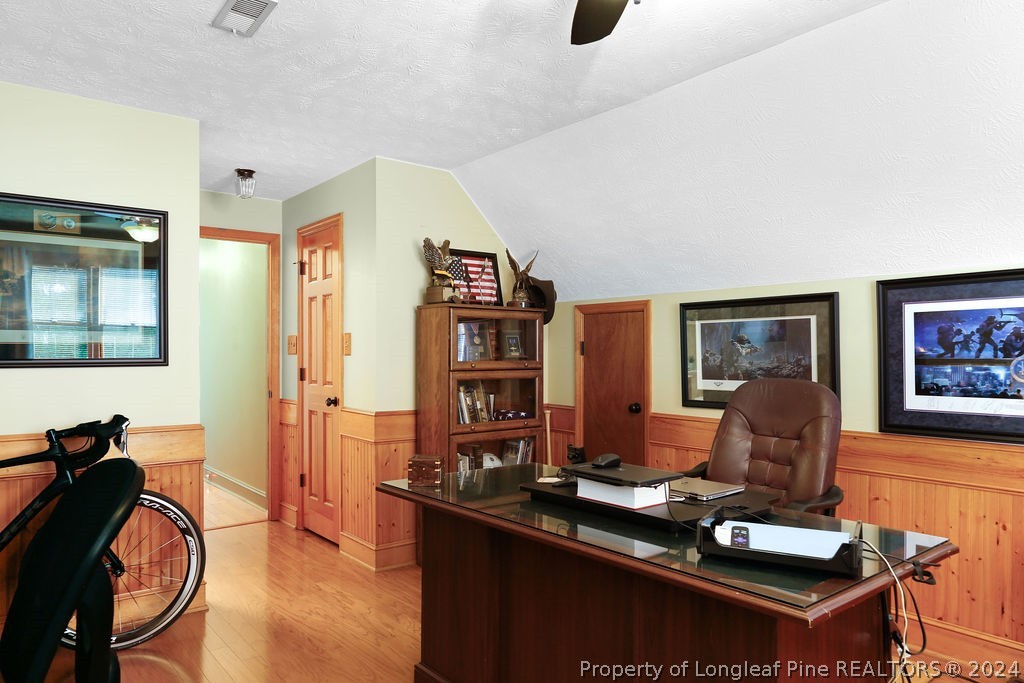 300 Shawcroft Road Fayetteville, NC 28311 - Photo 25 of 42 a living room with furniture gym equipment and a window