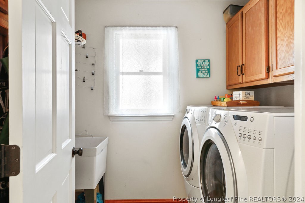300 Shawcroft Road Fayetteville, NC 28311 - Photo 28 of 42 a utility room with dryer and washer
